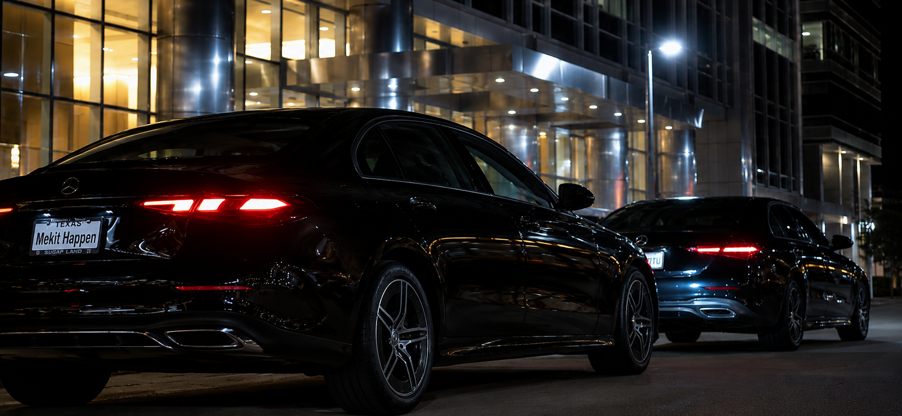 Two E-Class sedans downtown
